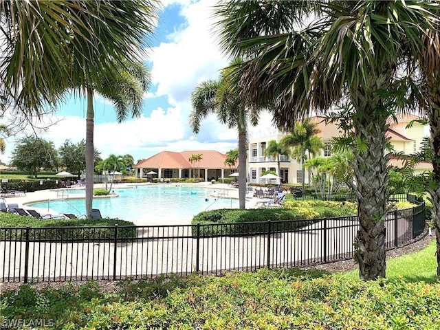 view of swimming pool featuring a patio area