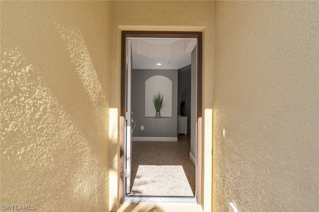 doorway to property with stucco siding