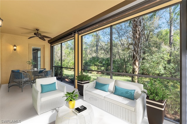 sunroom / solarium with ceiling fan