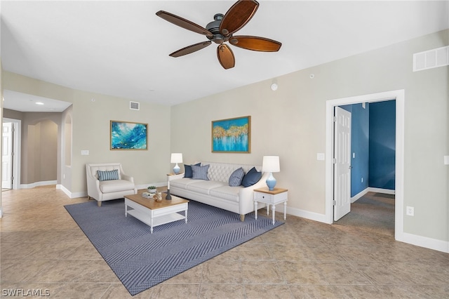 living room featuring ceiling fan