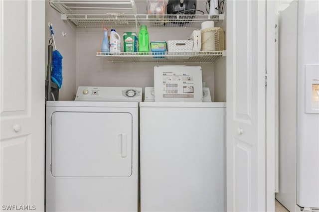 laundry room featuring washer and dryer