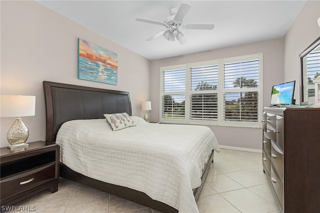 bedroom with light tile patterned floors and ceiling fan