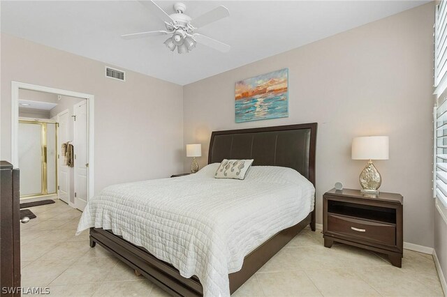 bedroom featuring multiple windows, ceiling fan, and light tile patterned floors