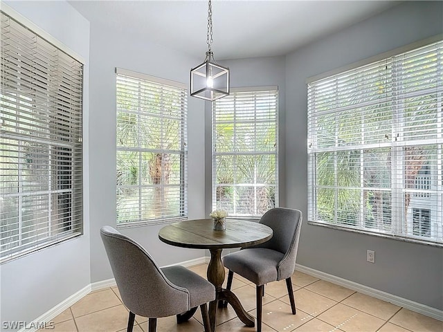 dining room with light tile patterned floors