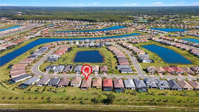 bird's eye view with a water view