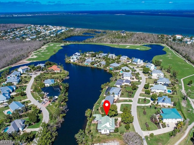 bird's eye view with a water view