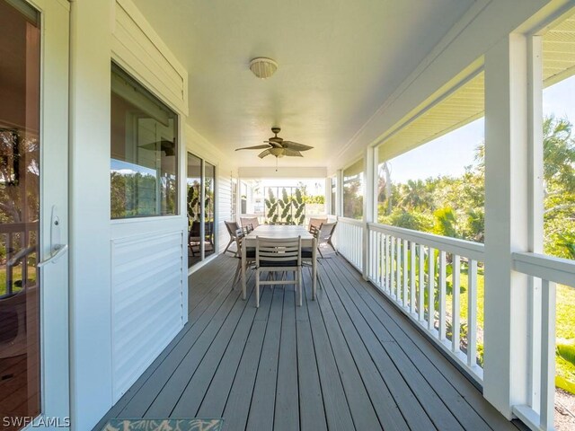 wooden deck with ceiling fan