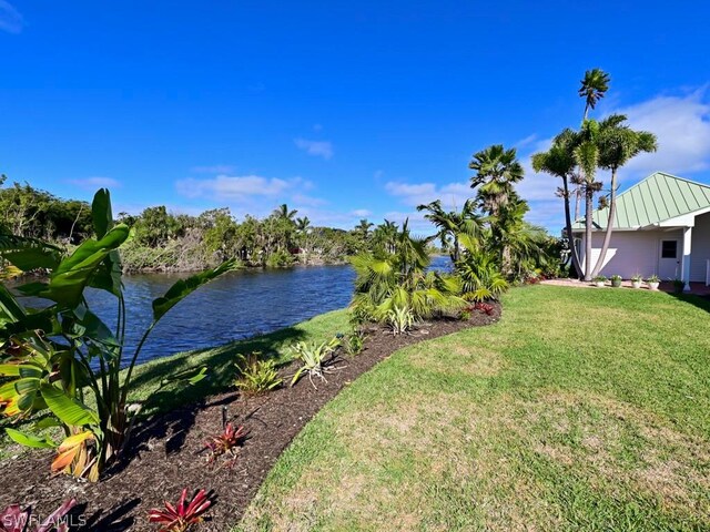 view of yard with a water view