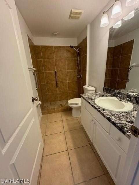 2813 52nd St W, Lehigh Acres, FL 33971 - full bathroom with vanity, a shower stall, and tile patterned flooring