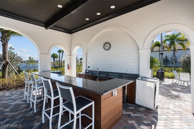 view of patio / terrace with a wet bar