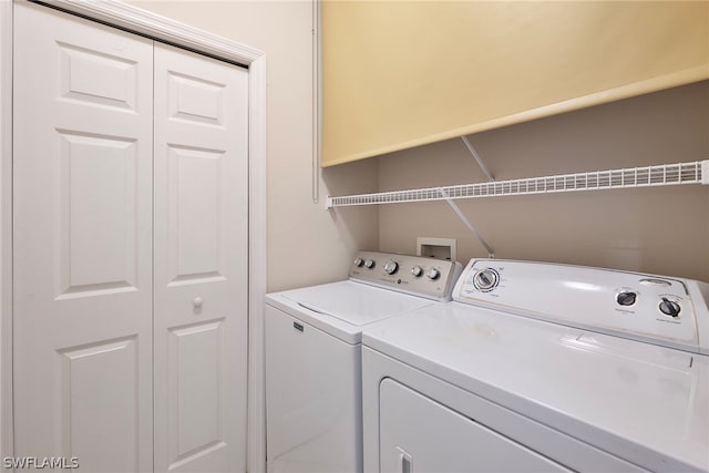 washroom featuring independent washer and dryer