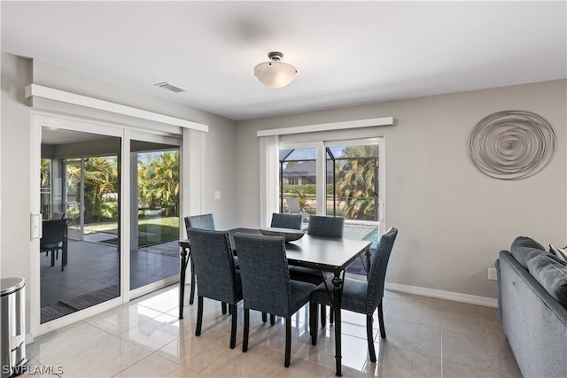 view of tiled dining area