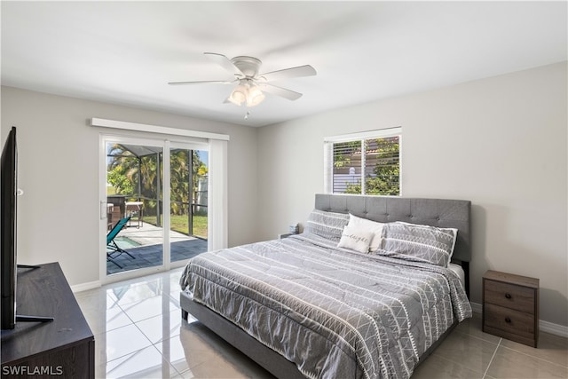 tiled bedroom featuring multiple windows, ceiling fan, and access to outside