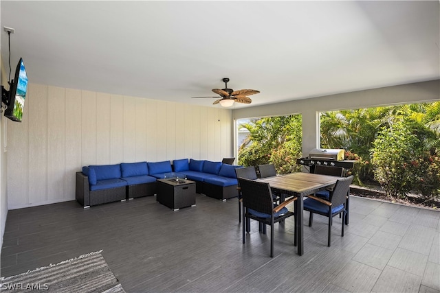 view of patio featuring outdoor lounge area, grilling area, and ceiling fan