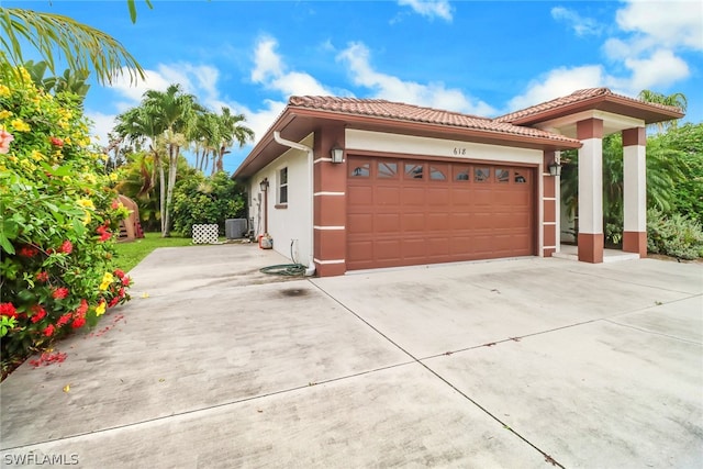 view of front of home with a garage