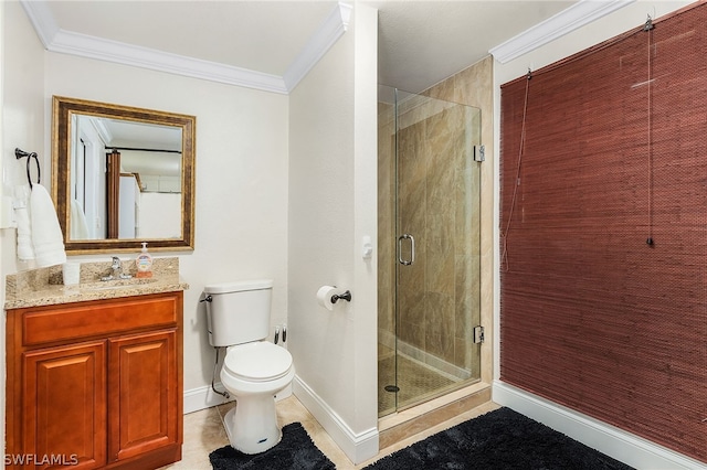 bathroom featuring crown molding, a shower with door, tile patterned flooring, vanity, and toilet