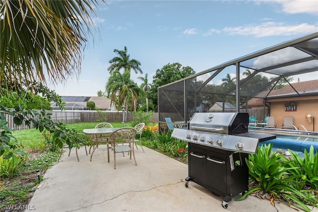 view of patio / terrace featuring a fenced in pool and a lanai