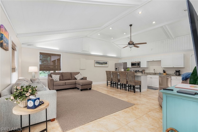 tiled living room featuring ceiling fan, high vaulted ceiling, sink, and beam ceiling