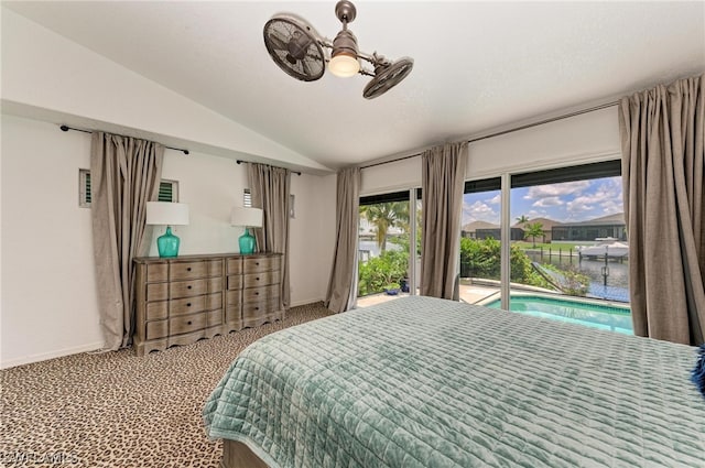 bedroom featuring vaulted ceiling, ceiling fan, carpet floors, and access to outside