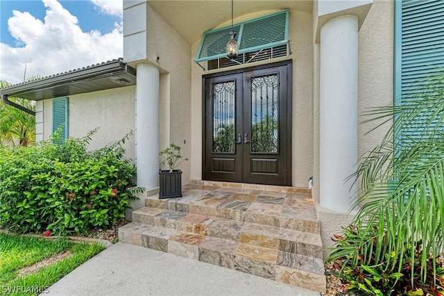 property entrance featuring french doors