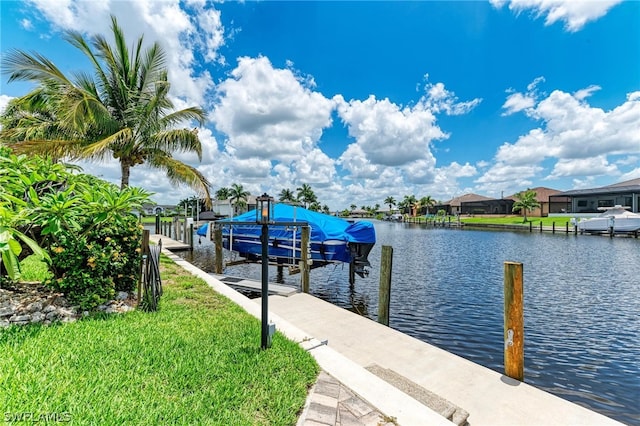 view of dock with a water view