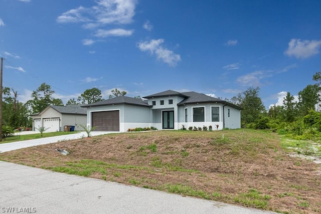 view of front of home with a garage