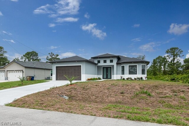 prairie-style home with a garage