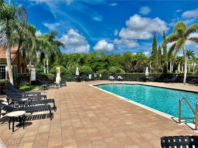 pool with a patio