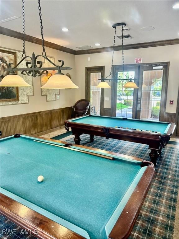 recreation room with a wainscoted wall, pool table, crown molding, and carpet