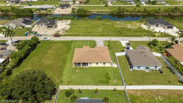 bird's eye view with a water view