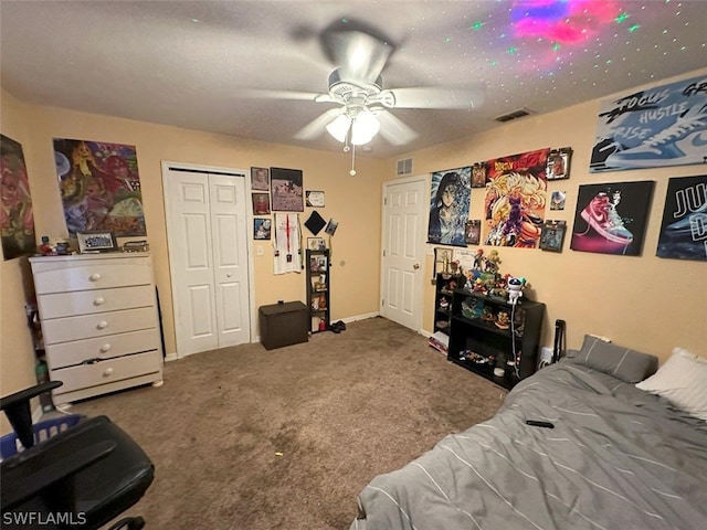 living room with carpet flooring, a textured ceiling, and ceiling fan