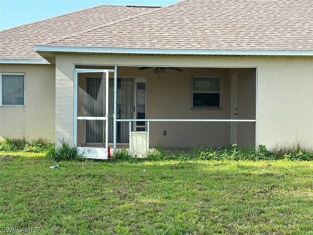 back of house with a yard