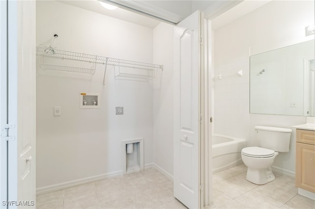 laundry room with light tile patterned floors and hookup for a washing machine