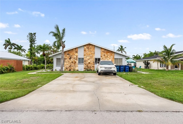 ranch-style house with a front yard