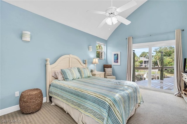 carpeted bedroom featuring multiple windows, access to outside, a ceiling fan, and high vaulted ceiling