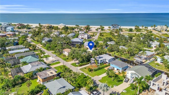 aerial view featuring a water view and a residential view