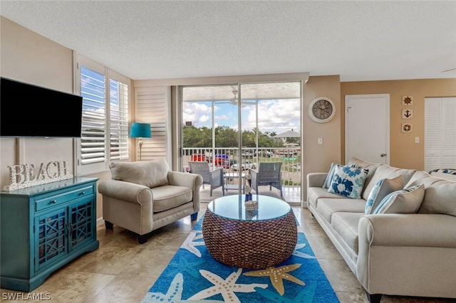 living room with a textured ceiling