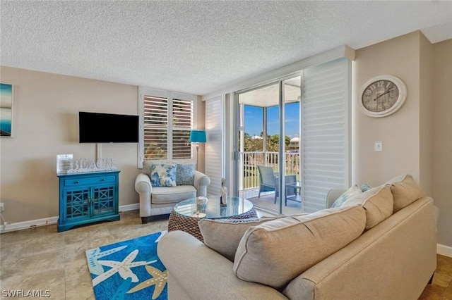 living room featuring a textured ceiling