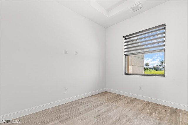 unfurnished room featuring light wood-type flooring