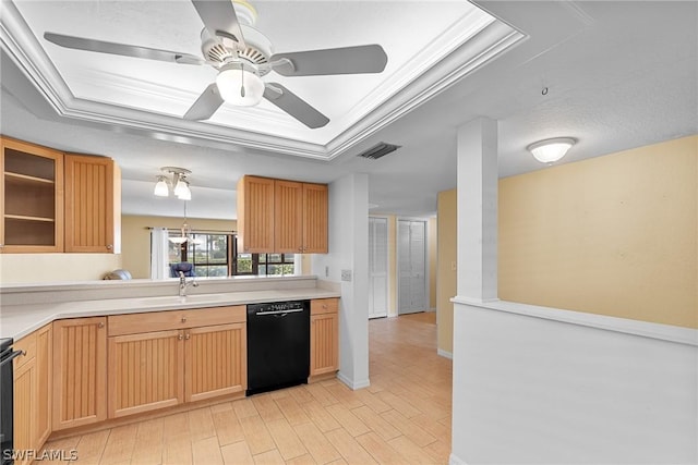 kitchen featuring black dishwasher, visible vents, a raised ceiling, light countertops, and light wood-style floors