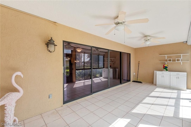 interior space featuring ceiling fan