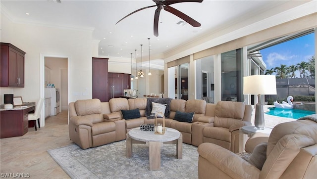 living room featuring ceiling fan and ornamental molding