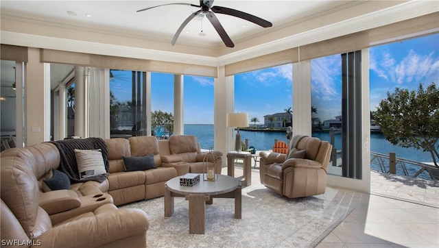 interior space featuring ceiling fan and a water view