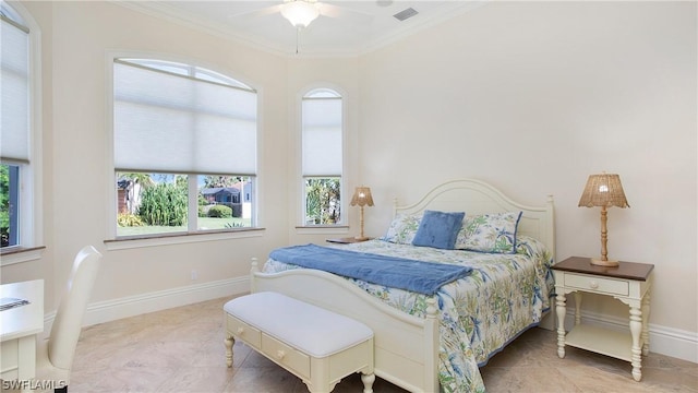 bedroom with ceiling fan and crown molding