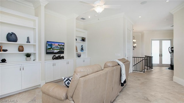 living room featuring ornamental molding, ceiling fan, and built in features