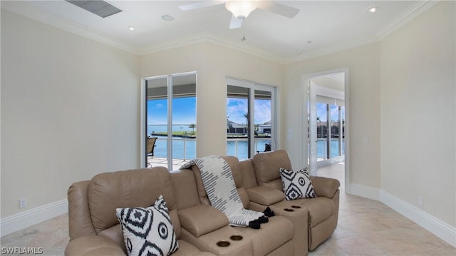 living room with ceiling fan, crown molding, and a water view