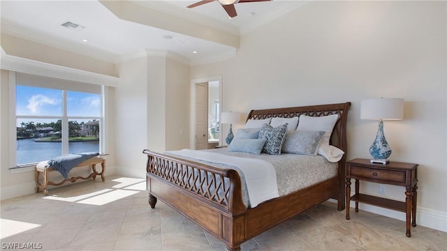 bedroom with ceiling fan, ornamental molding, and a water view