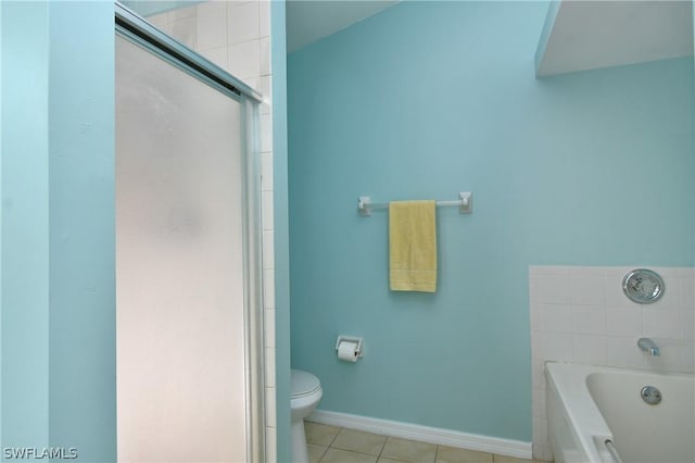 bathroom featuring shower with separate bathtub, tile patterned floors, and toilet