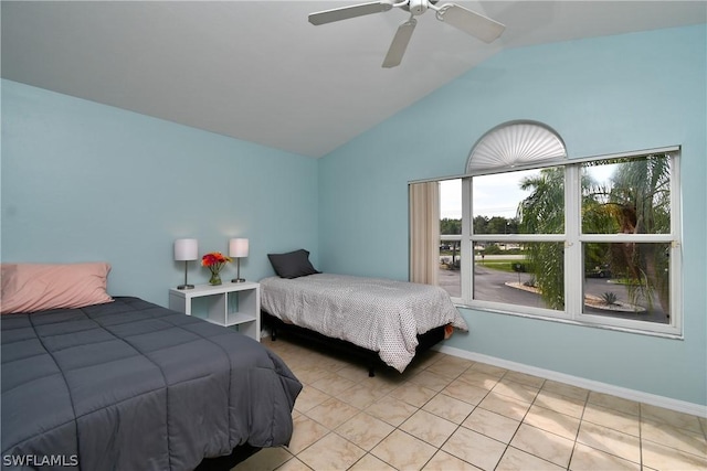 tiled bedroom with vaulted ceiling and ceiling fan