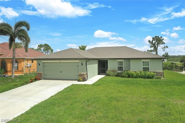 ranch-style house featuring a garage and a front yard